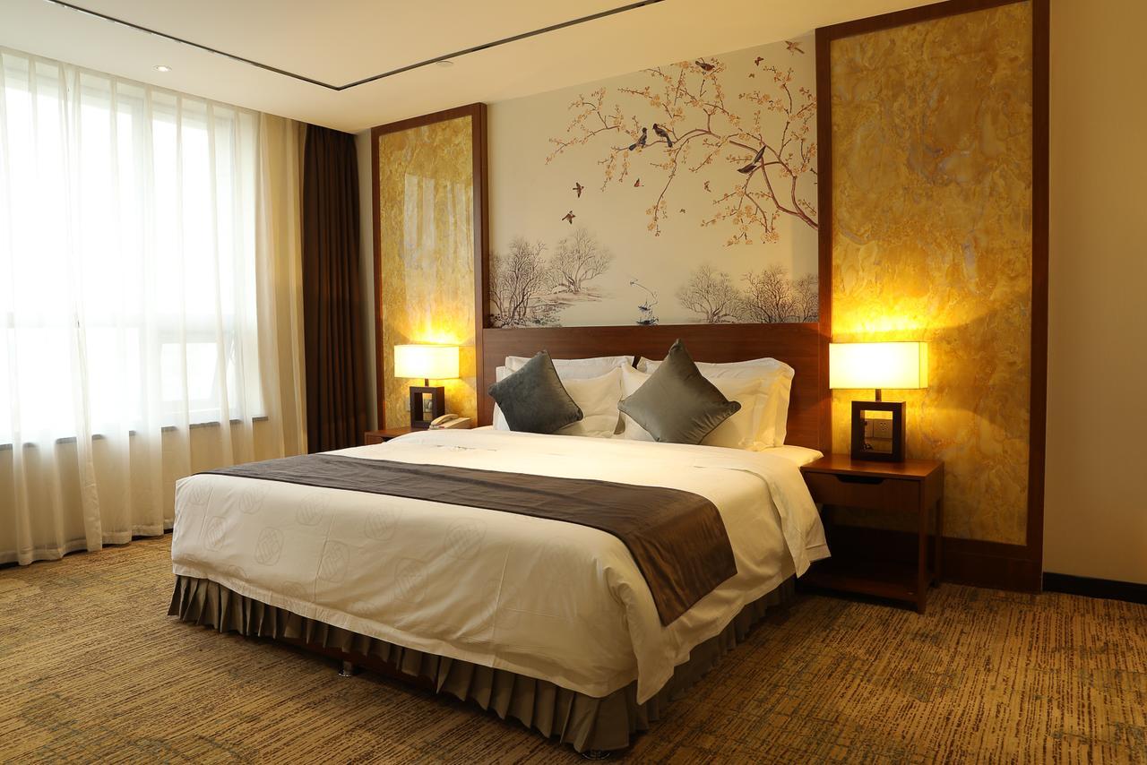 Zhi Hui Tang Feng Ze Hotel Chengdu Bagian luar foto